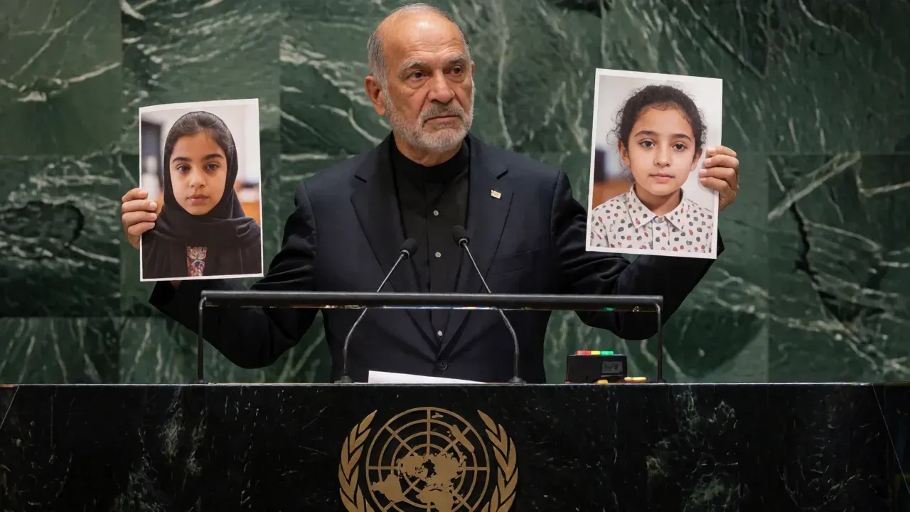 US delegation storms out as Iranian president holds up images of slain children
